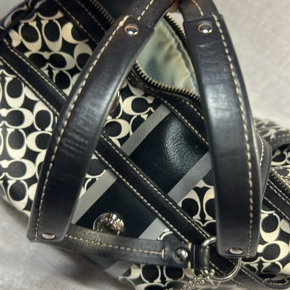Coach boston leather travel bag with a tag